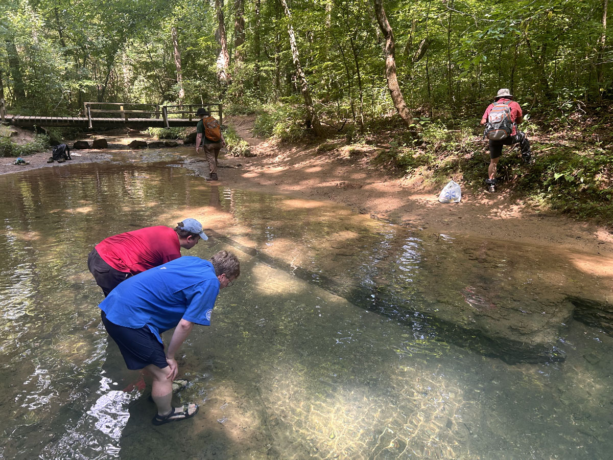 Philip and Anthony wading in Blue Hole Spring